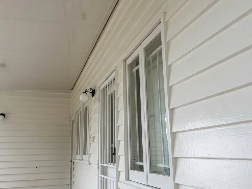 Brisbane verandah and weatherboards after external house washing, clean and bright
